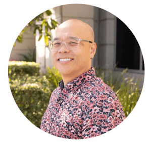 Professional headshot of Jimmy Kwan, Business Developer at Apex, smiling in a floral shirt.