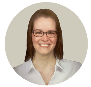 Lindsey Mann, Controller at Apex Facility Resources, smiling and wearing glasses and a white blouse.