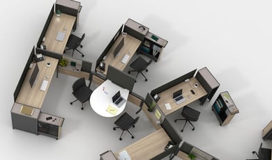 An aerial view of office pods with ergonomic workstations, wooden desks, and privacy panels, designed for collaboration.